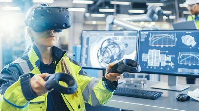 Factory: Female Industrial Engineer Wearing Virtual Reality Head