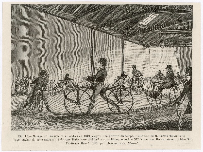 19th-century drawing of people in fancy clothes and top hats learning to ride a bicycle. They're in a big, empty room and riding in a circle.