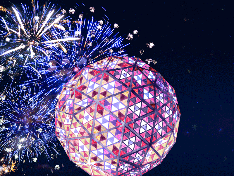 The Times Square New Year's Eve Ball sitting in front of fireworks on a night sky. Engineering the Times Square New Year’s Eve Ball Drop.